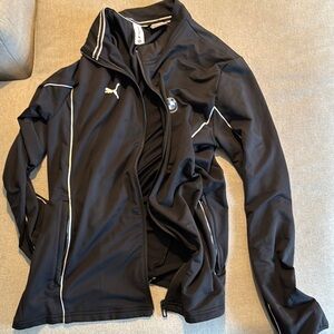 Puma Black Performance Jacket with Lightweight Design and High Collar